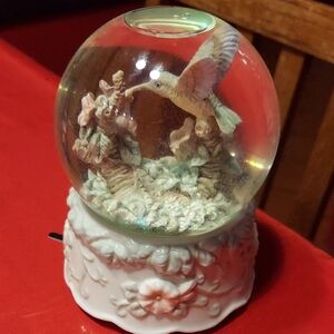 Elegant Hummingbird Snow Globe with Floral Base